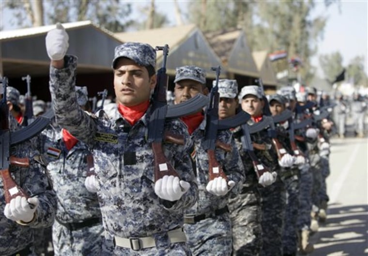 Iraqi federal police march during a graduation ceremony in Baghdad, Iraq, on Dec. 19. The federal Police Training School graduated 600 cadets on Sunday. 